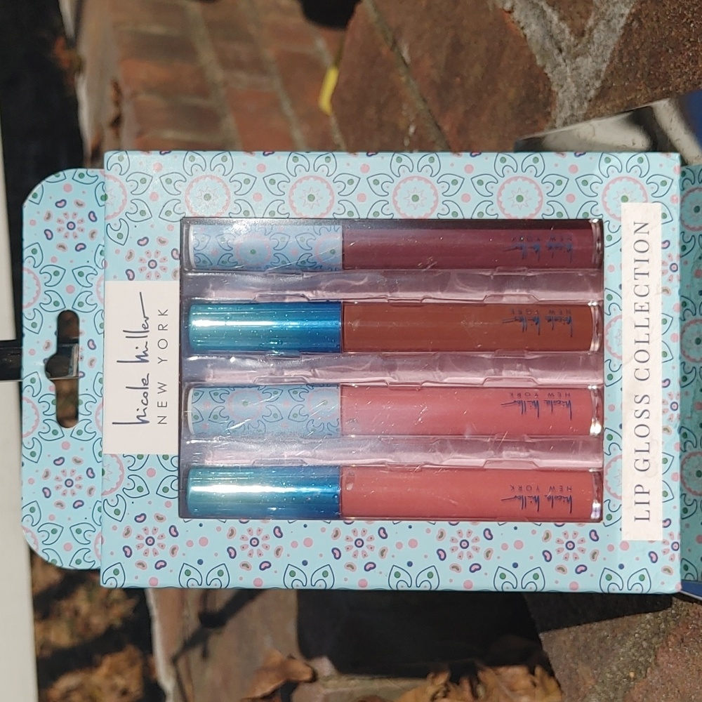 Nicole Miller 4 Piece Lip Gloss Set